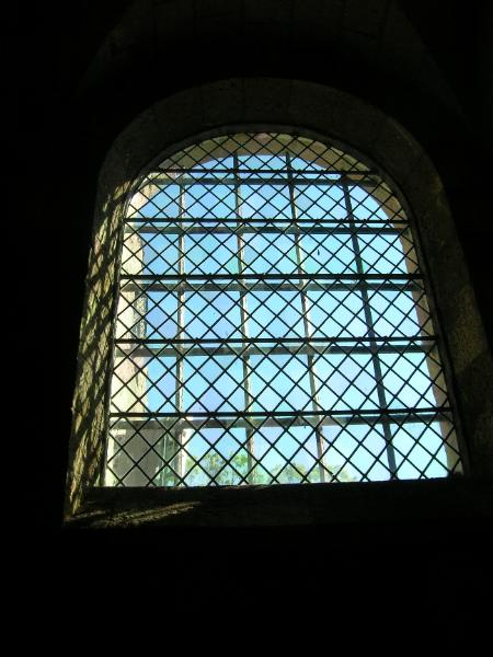 Glass windows began appearing in castles in the late 12th century. This window is from the Cloisters Museum in New York